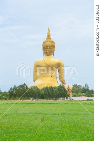 Golden Buddha in countryside. Large Buddha 33256013