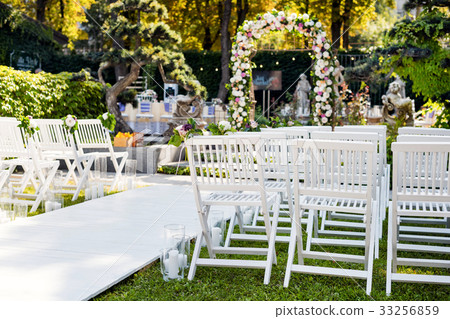 Wedding arch with flowers outdoors. Beautiful Wedding arch with flowers outdoors. Beautiful 33256859