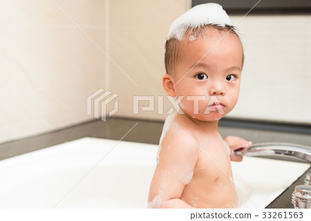 lovely handsome little boy children washing body lovely handsome little boy children washing body 33261563