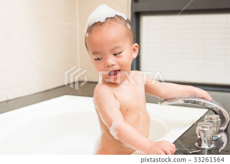 happy smiling little boy son put foam bubble happy smiling little boy son put foam bubble 33261564