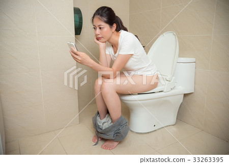 beautiful young woman using mobile cell phone beautiful young woman using mobile cell phone 33263395