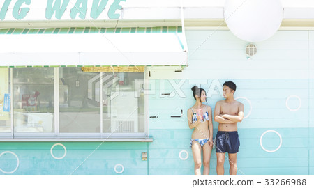 Poolside couple to rest Poolside couple to rest 33266988
