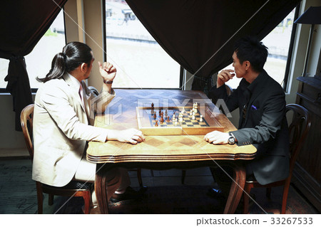 Men enjoying chess Men enjoying chess 33267533