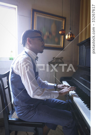 Men playing an instrument 33267617