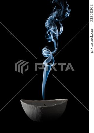 Incense smoke / black background Incense smoke / black background 33268308