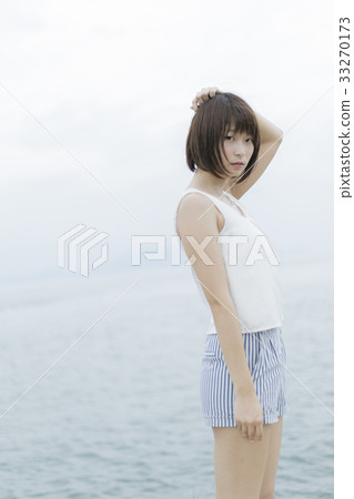 A woman in the sea 33270173