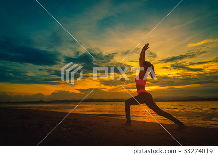 Silhouette young woman practicing yoga Silhouette young woman practicing yoga 33274019