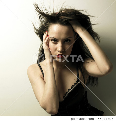 Magnificent young woman in corset Magnificent young woman in corset 33274707