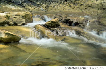 Waterfall on a Mountain River of Crimea 33277146