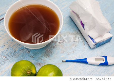 Hot sugarcane-water (aguapanela) with lemon Hot sugarcane-water (aguapanela) with lemon 33281432