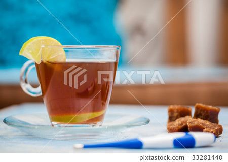 Hot sugarcane-water (aguapanela) with lemon Hot sugarcane-water (aguapanela) with lemon 33281440