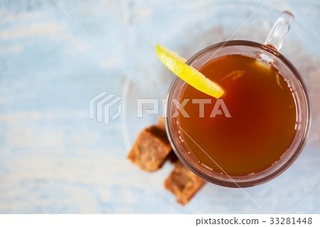Hot sugarcane-water (aguapanela) with lemon Hot sugarcane-water (aguapanela) with lemon 33281448