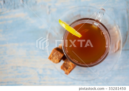 Hot sugarcane-water (aguapanela) with lemon Hot sugarcane-water (aguapanela) with lemon 33281450