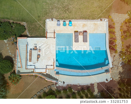 Pool with seats and chairs 33281753