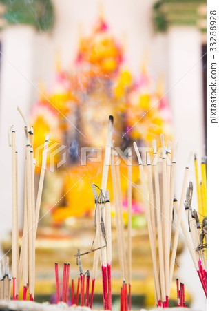 Incense in a pot at the Buddha image. Faith, Incense in a pot at the Buddha image. Faith, 33288928