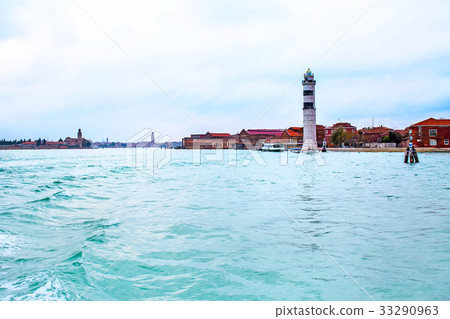 The lighthouse at the Murano Island, Venice, Italy The lighthouse at the Murano Island, Venice, Italy 33290963