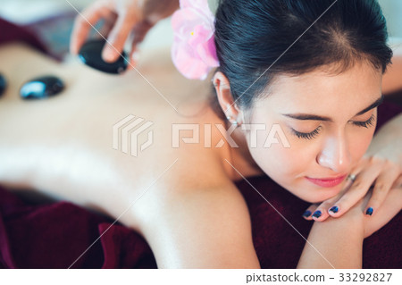 Hot black stone spa and Asian lady relax in spa 33292827