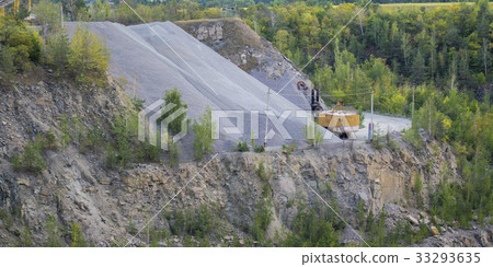 huge excavator, truck and man standing  33293635