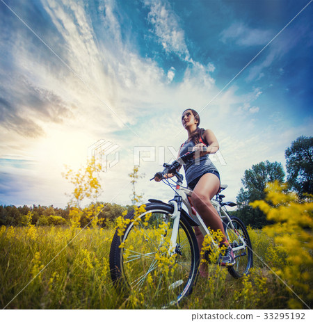 woman with bike enjoy summer vacation woman with bike enjoy summer vacation 33295192
