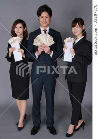 Businessman & Business Woman Holding Bill 33297576