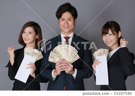 Businessman & Business Woman Holding Bill 33297580