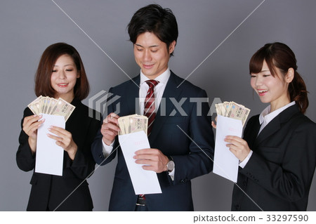 Businessman & Business Woman Holding Bill 33297590