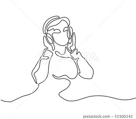 Woman listening to music on headphones 33300142