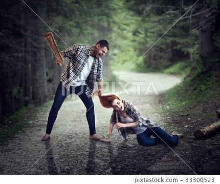 Husband beats wife in forest, domestic violence 33300523