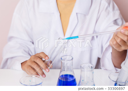 Asian girl playing as a scientist 33300897