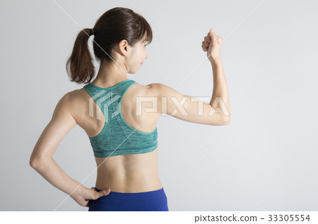 Muscled young woman Muscled young woman 33305554