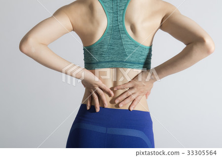 Young lady with low back pain 33305564