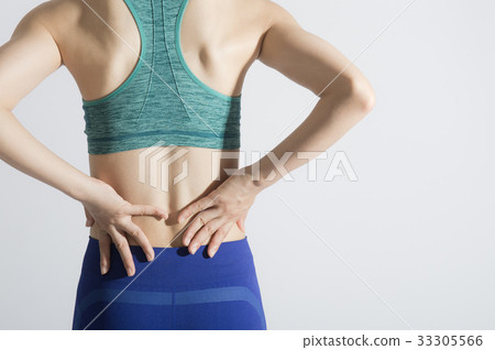 Young lady with low back pain Young lady with low back pain 33305566