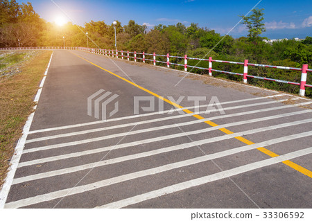 Sunlight guide road in mountain forest sky Sunlight guide road in mountain forest sky 33306592