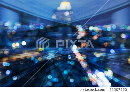 Motion blurred moving train with city bokeh light 33307360