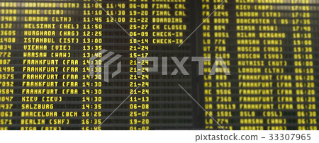 The blurry image of flight schedule board 33307965
