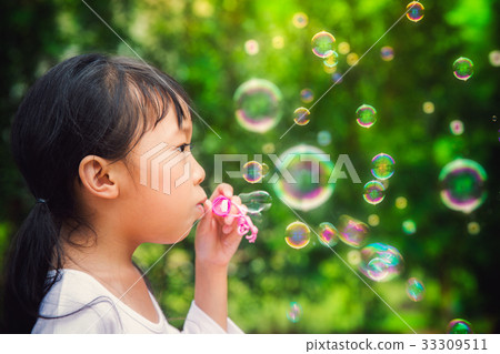 Asian kid play a bubble Asian kid play a bubble 33309511