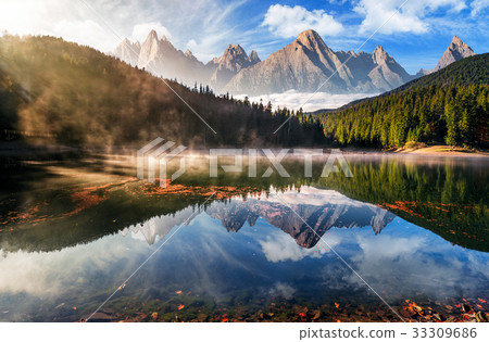 gorgeous mountain lake in autumn fog gorgeous mountain lake in autumn fog 33309686