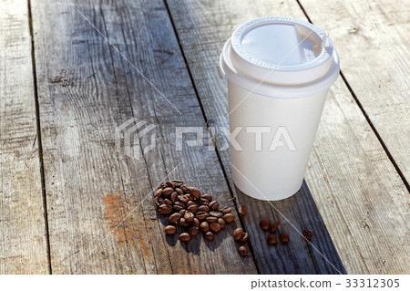 Coffee on a wooden table Coffee on a wooden table 33312305