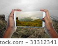 Travel concept, take photography fog and mountain 33312341