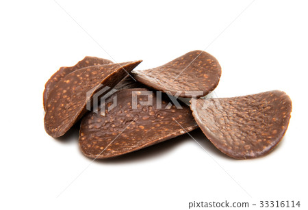 Chocolate chips with nuts isolated Chocolate chips with nuts isolated 33316114