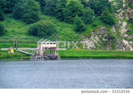 Small hydroelectric power station in mountains Small hydroelectric power station in mountains 33318550