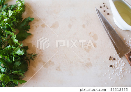 Cutting wooden desk with parsley and knife Cutting wooden desk with parsley and knife 33318555