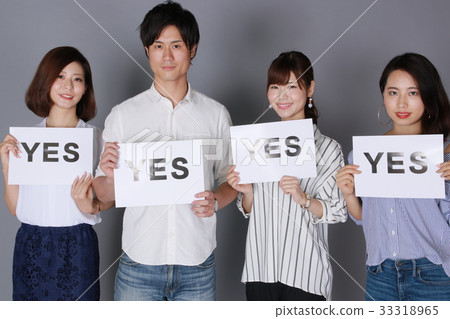 Young four-man couple showing unanimous YES (affirmation) Young four-man couple showing unanimous YES (affirmation) 33318965