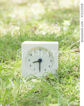 Square simple white clock on the grass 8:30 Square simple white clock on the grass 8:30 33322026