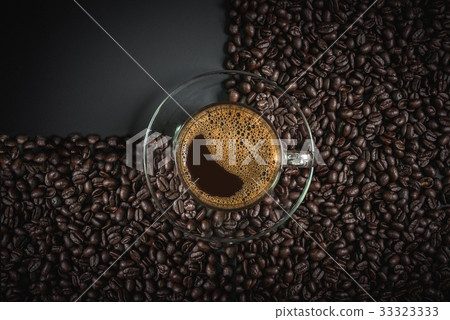 espresso in a glass on wooden table 33323333