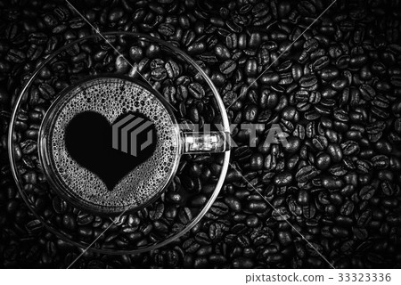 espresso in a glass on wooden table 33323336