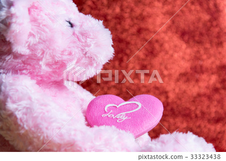 teddy Bear with Heart on red background teddy Bear with Heart on red background 33323438