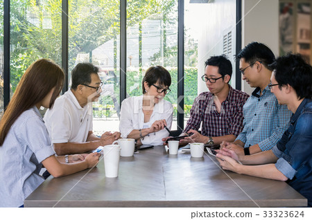 Group of Asian Business People with casual suit are meeting in the modern Office or coffee shop, people group shot concept 33323624