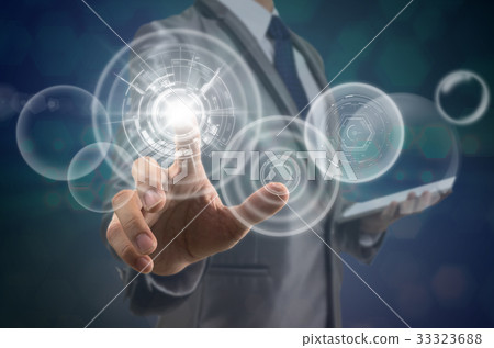 Businessman pointing the modern virtual screen over the photo blurred background, business and technology concept Businessman pointing the modern virtual screen over the photo blurred background, business and technology concept 33323688