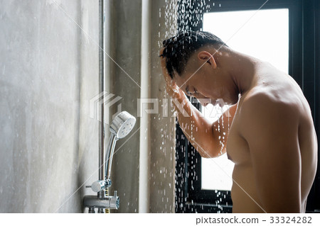 a photo of a man taking a shower in the bathroom 33324282